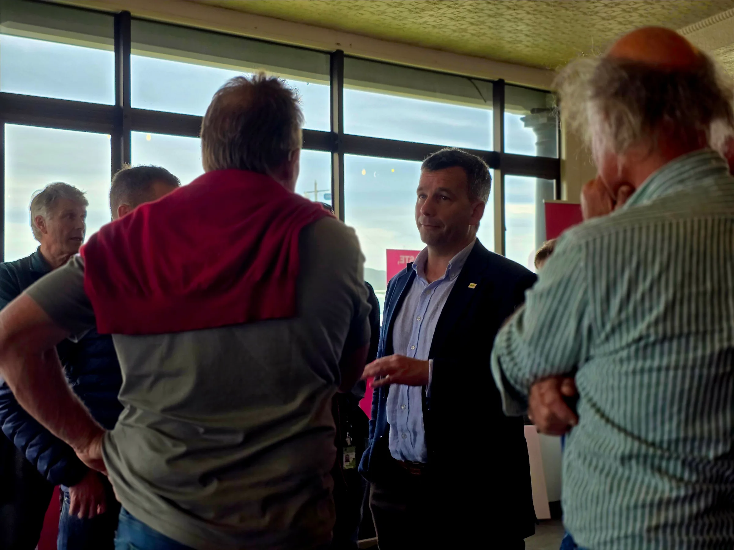 ACT Leader and Deputy Prime Minister David Seymour speaks to people after a public meeting in Hastings.